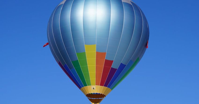 Experiences - Hot Air Balloon Flying Against Blue Sky