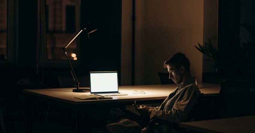 Stay - Man in Black and White Stripe Dress Shirt Sitting on Chair in Front of Macbook