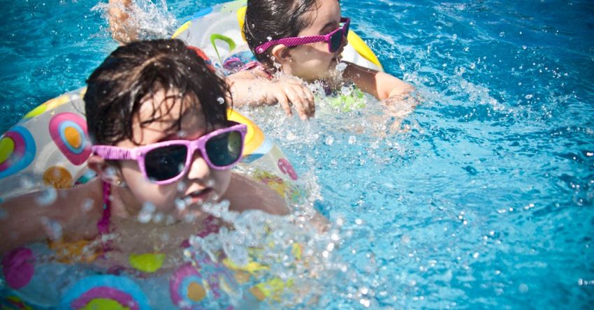 Activities - 2 Girl's Swimming during Daytime