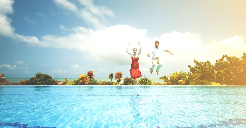 Weekend - Man and Woman Jump on Water